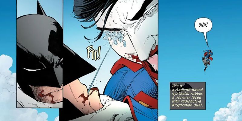 Batman escupiendo chicle de kriptonita a Superman