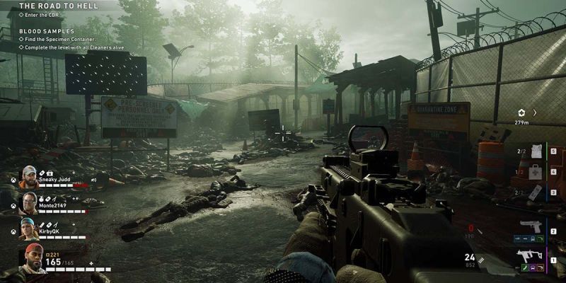 Un jugador avanza a través de un área abandonada llena de cadáveres con tres compañeros cooperativos en Back 4 Blood