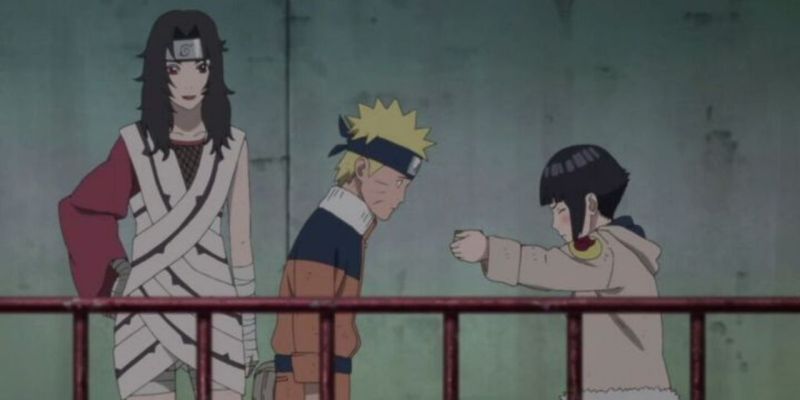 Hinata dando pomada a Naruto