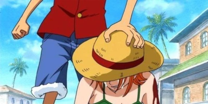 La imagen muestra a Monkey D. Luffy consolando a Nami llorando - One Piece