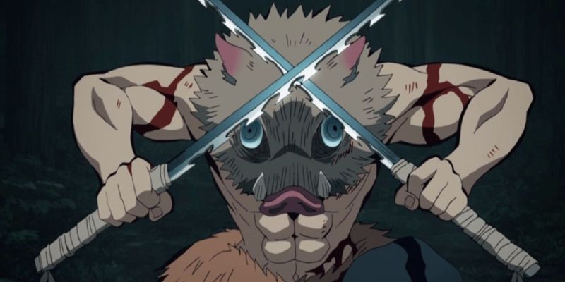 Inosuke con espadas en Demon Slayer