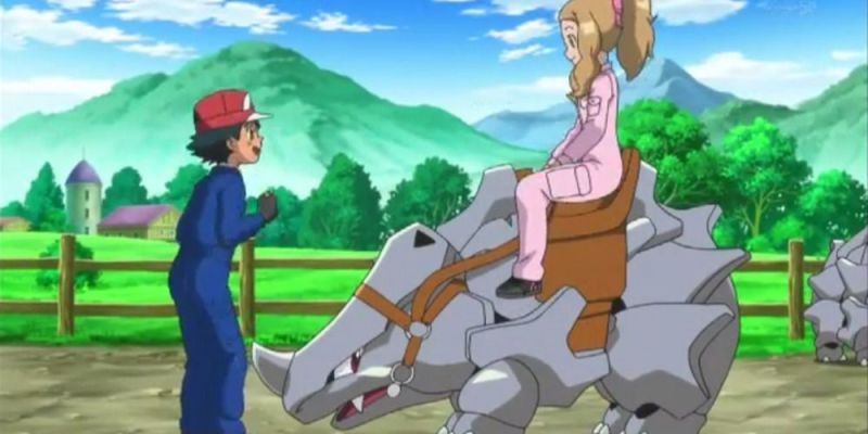 Serena reitet in Pokemon Anime auf einem Rhyhorn