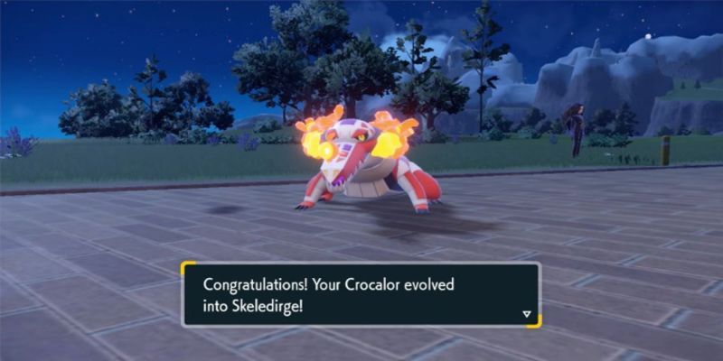 Un Crocalor evoluciona a Skeledirge en Pokémon Scarlet y Violet